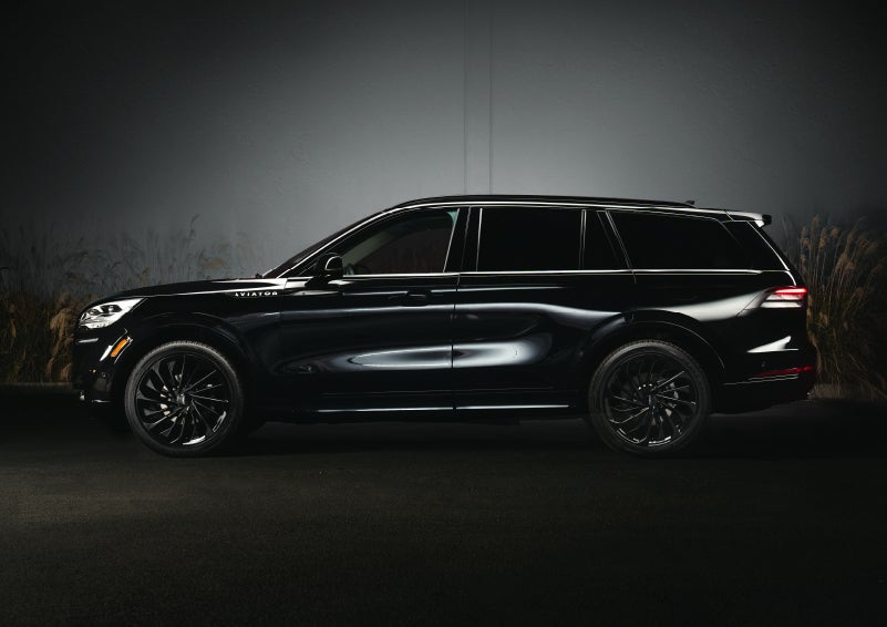 A 2024 Lincoln Aviator® SUV is shown in the Infinite Black exterior color | Boulevard Lincoln in Georgetown DE