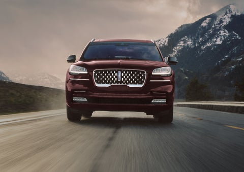 A 2024 Lincoln Aviator® SUV is shown in the Diamond Red exterior color. | Boulevard Lincoln in Georgetown DE