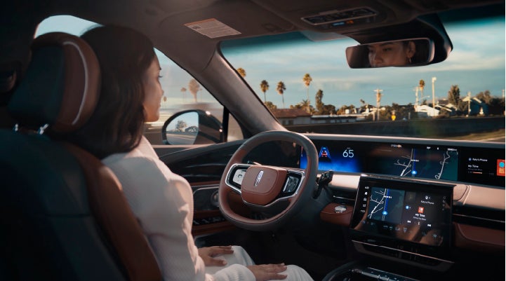 A person is shown driving hands-free on the highway with available Lincoln BlueCruise technology. | Boulevard Lincoln in Millsboro DE