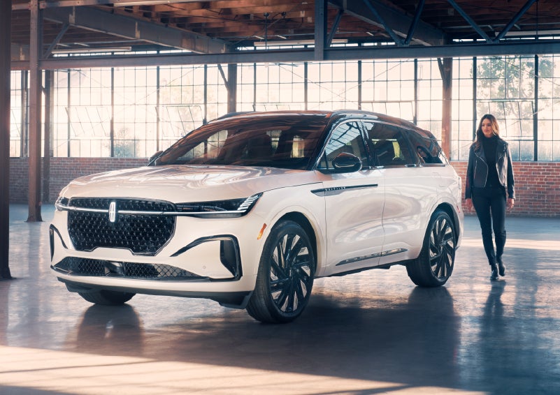 A person approaches a 2025 Lincoln Nautilus® SUV. | Boulevard Lincoln in Millsboro DE