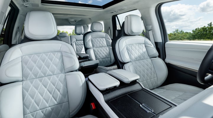 The interior of a 2025 Lincoln Black Label Navigator® SUV with the new Atmospheric theme.