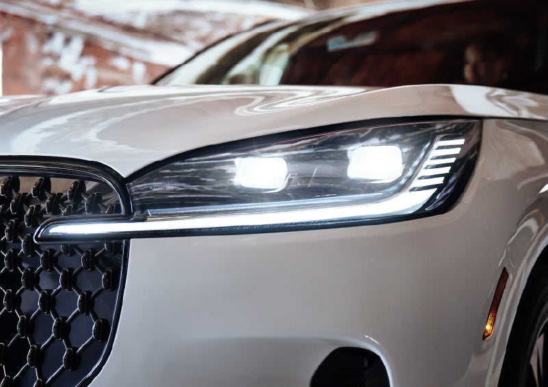 A close-up of a headlamp on the 2026 Lincoln Aviator® SUV is shown. | Boulevard Lincoln in Millsboro DE