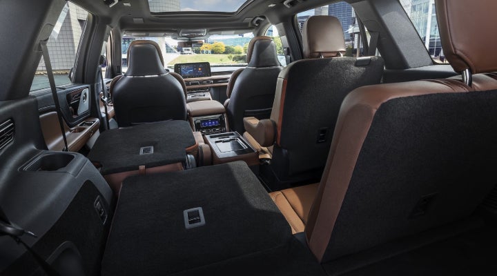 One side of the PowerFold® third-row seat and a second-row seat are folded forward in the 2026 Lincoln Aviator® SUV. | Boulevard Lincoln in Millsboro DE