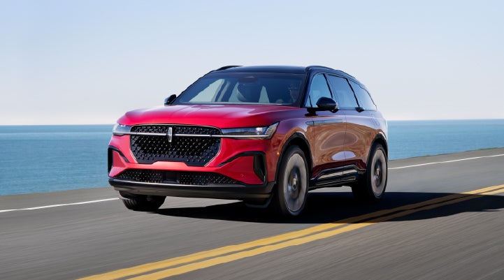 A 2026 Lincoln Nautilus® SUV is being driven on a seaside roadway. | Boulevard Lincoln in Millsboro DE