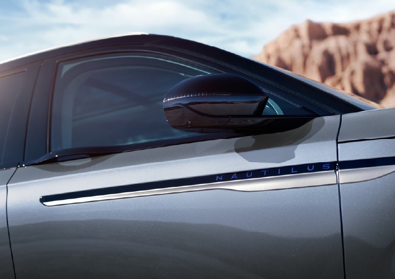 Blue lettering on the side of the vehicle that reads Nautilus indicates the available Hybrid Powertrain. | Boulevard Lincoln in Millsboro DE