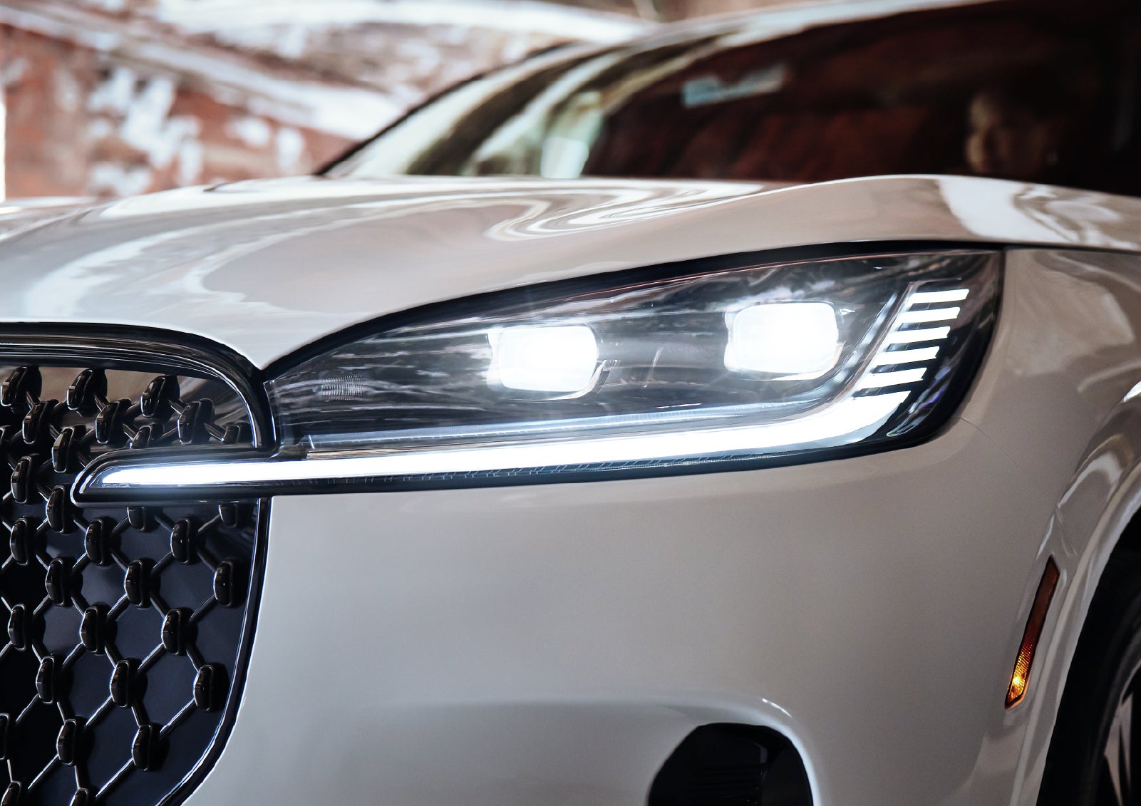 A close-up of a headlamp on the 2027 Lincoln Aviator® SUV is shown. | Boulevard Lincoln in Millsboro DE